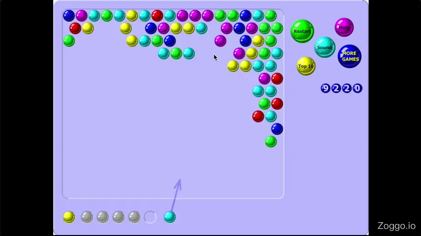 Bubble Shooter avalanche chain reaction clearing a large hanging cluster